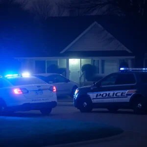 A police presence at a suburban home after a shooting incident.