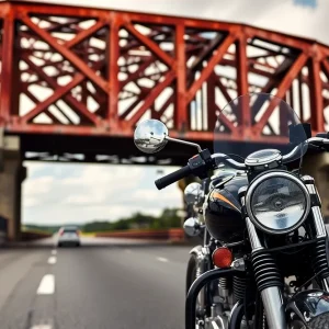 A peaceful view of Wonderwood Bridge with an antique motorcycle in the foreground.