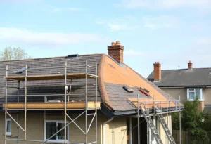 Construction site showing incomplete roofing work