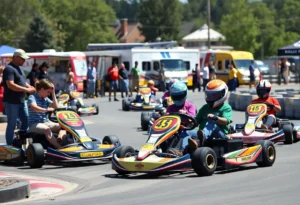 Families enjoying a kart racing event with karts on the track